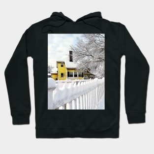 Yellow House with Snow Covered Picket Fence Hoodie